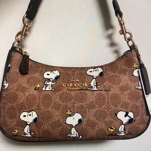 Coach X Peanuts Teri Shoulder Bag In Signature Canvas With Snoopy Print